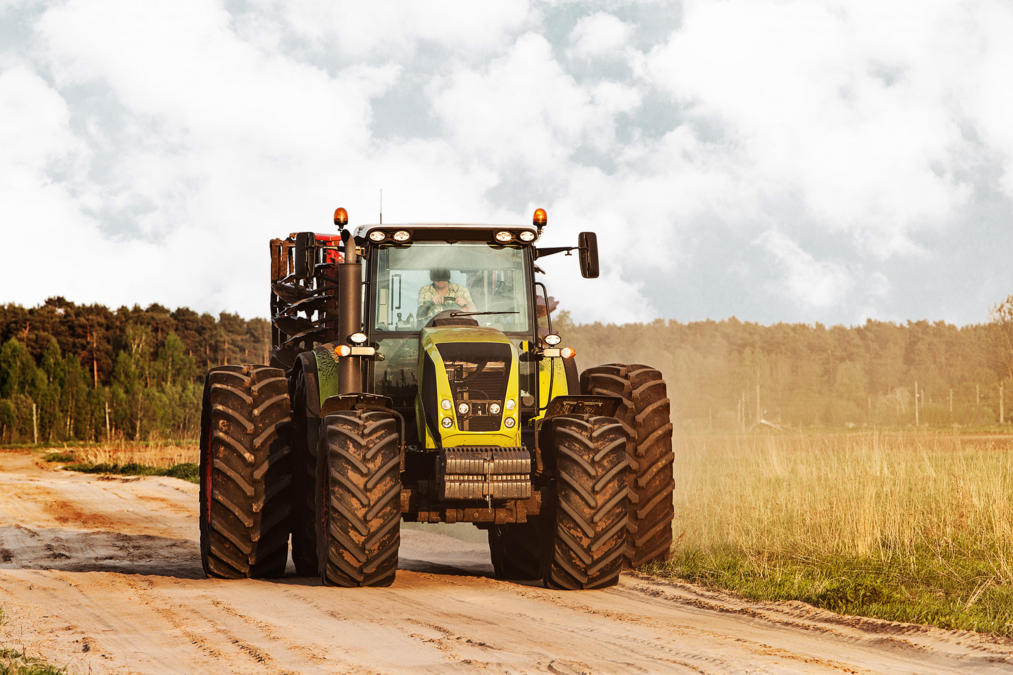 tractor road countryside near meadows В Мордовии тракторист остался без прав