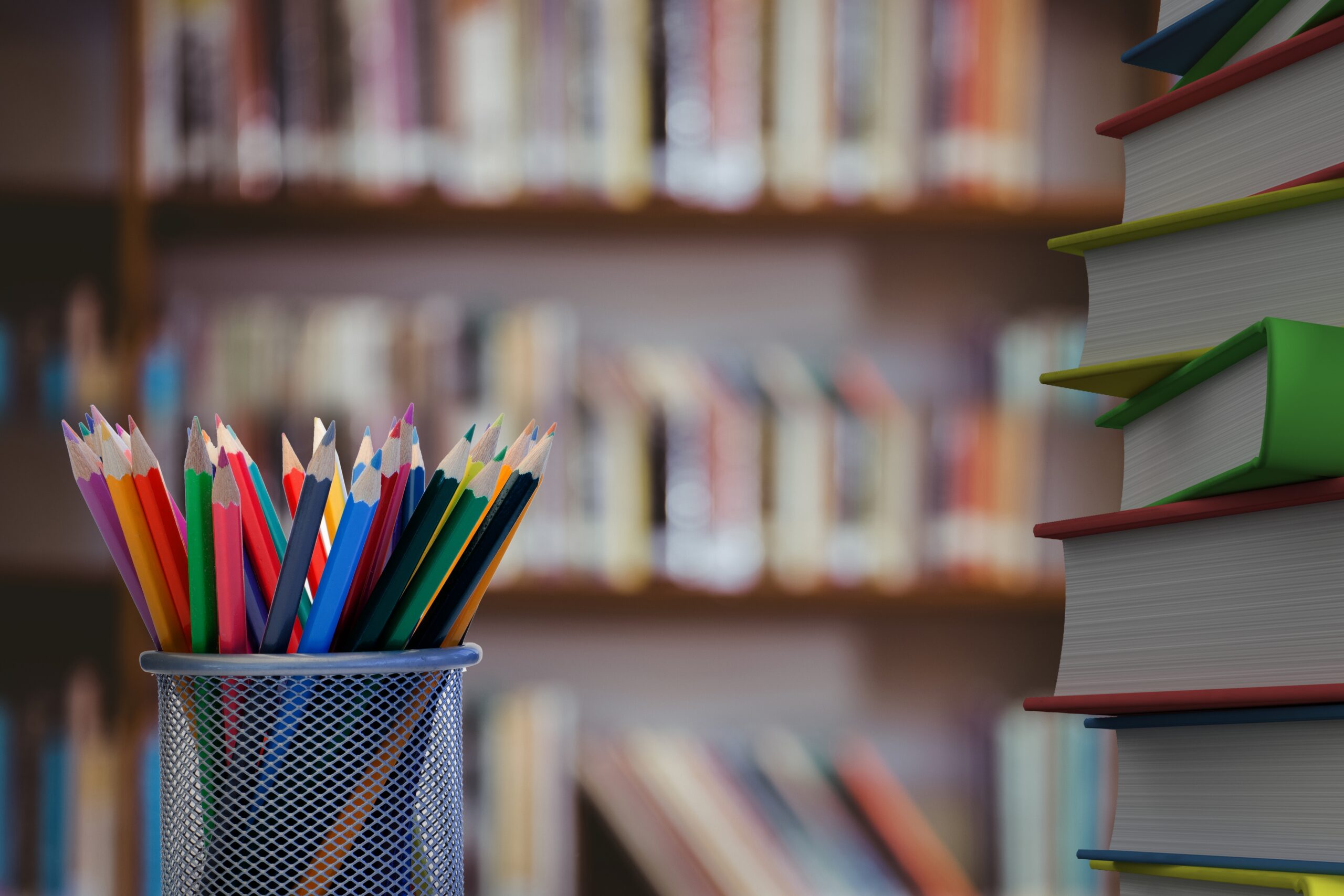 close up colored pencils with books scaled В Саранске состоится День абитуриента Мордовского госуниверситета